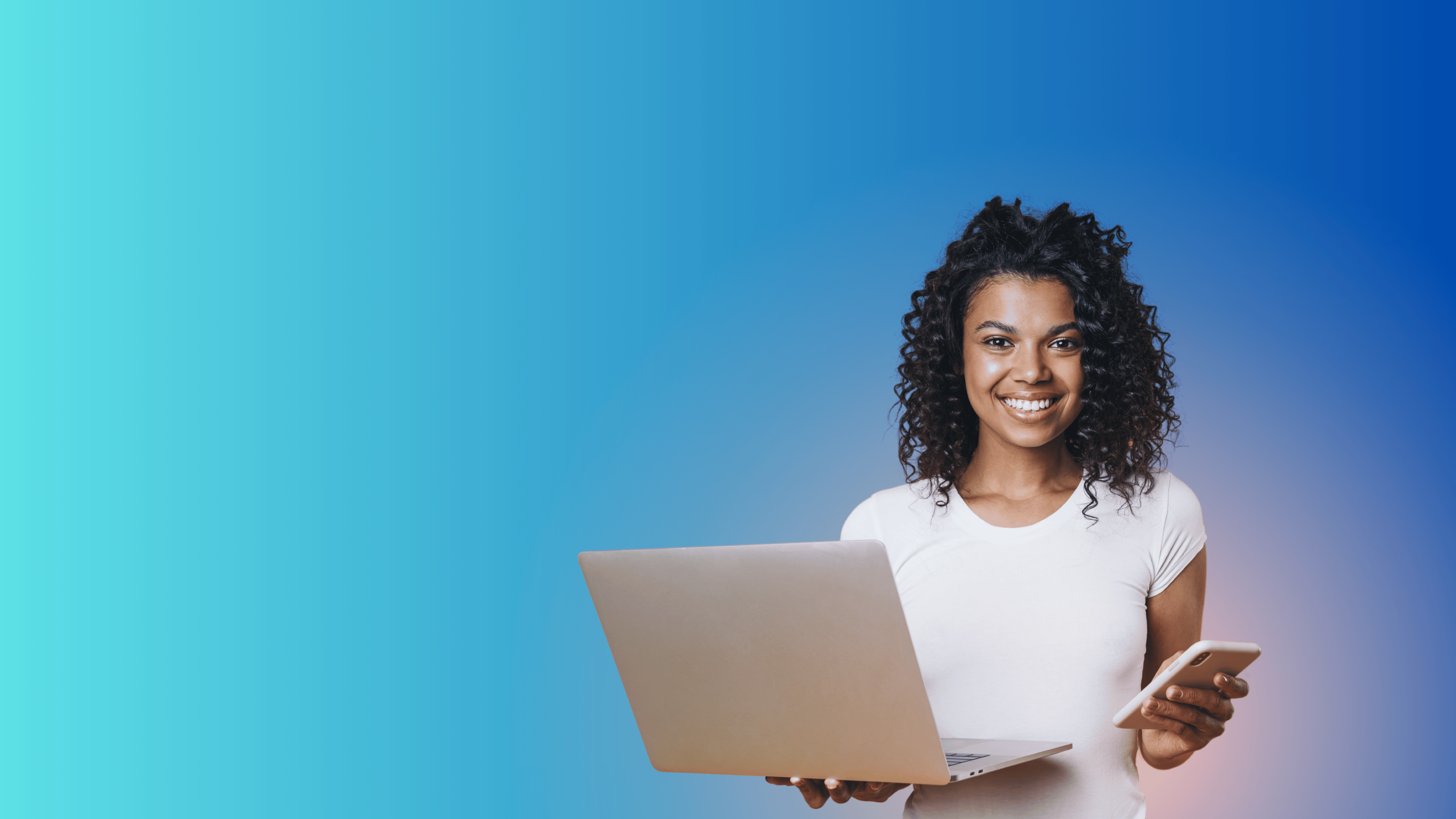 Woman holding a laptop and smartphone against a blue gradient background